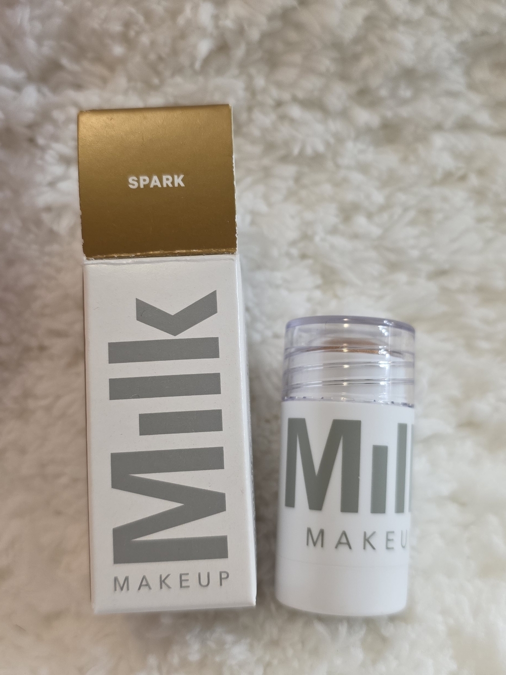 Milk Makeup Spark Cream-to-Powder Highlighter Stick - White & Gold Accents